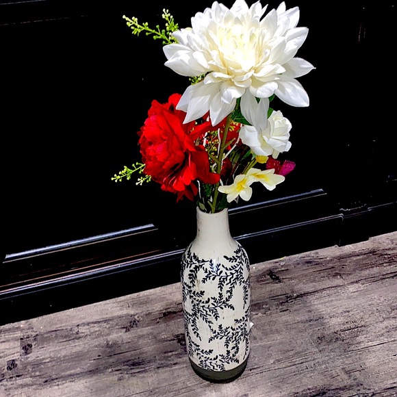 Silk flowers high end all of mine are and a beautiful vase with it